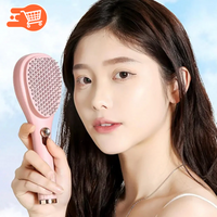 Peine autolimpiante que reduce la caída y la rotura del cabello