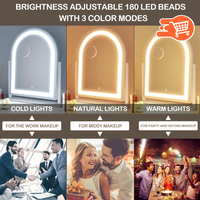 Espejo de maquillaje iluminado con control táctil y rotación de 360°