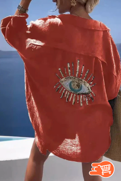 blusa con botones del mal de ojo Precio regular