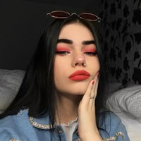 Laura M.