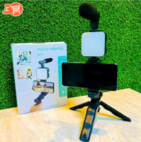 Kit de vlogging para crear videos (mini trípode, micrófono, luz LED y clip para teléfono)
