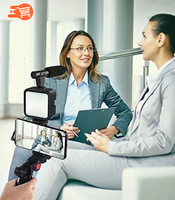 Kit de micrófono con trípode y luz LED