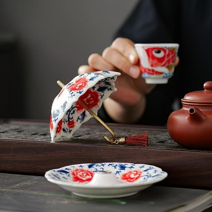 Colador de té con forma de paraguas