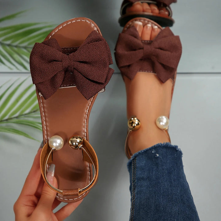 Sandalias planas con lazo para mujer