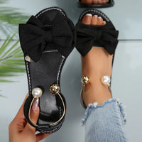 Sandalias planas con lazo para mujer