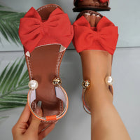 Sandalias planas con lazo para mujer